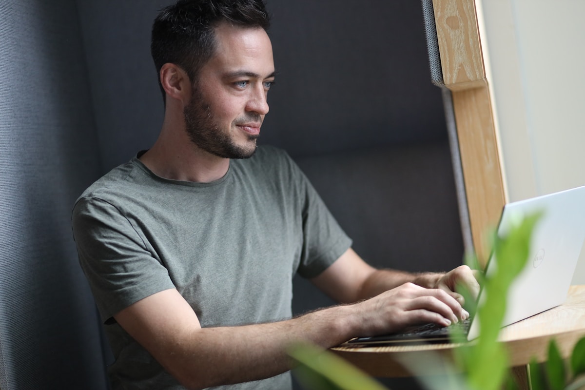 A founder working at a laptop