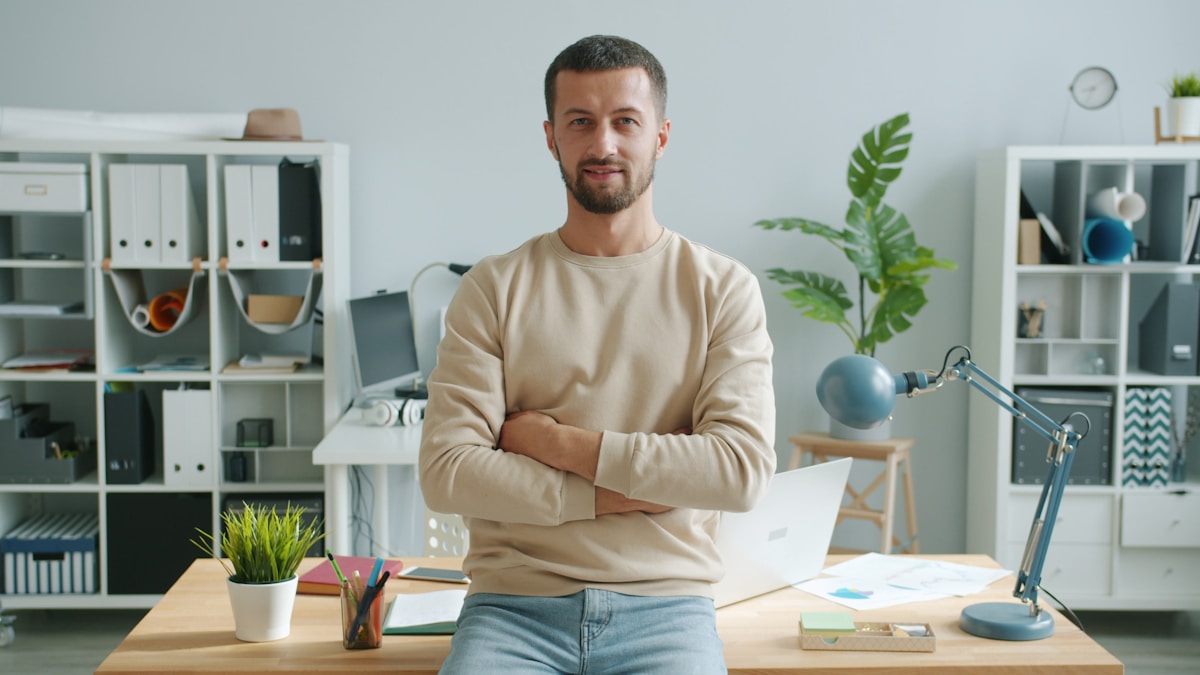 A founder reviewing their work in a modern workspace