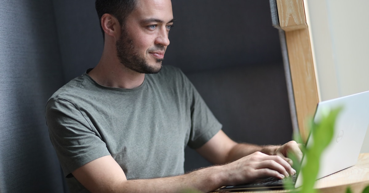 A founder reviewing a feed full of look-alike posts